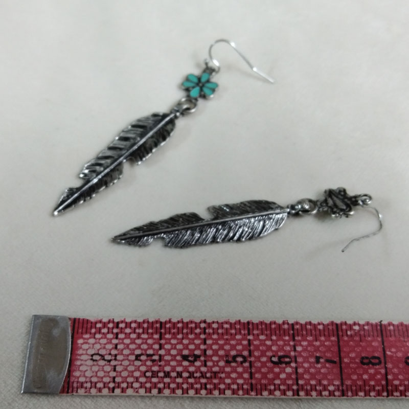 Pendientes colgantes de plumas - Vintage Fashion Jewelry Brands reseña y precio